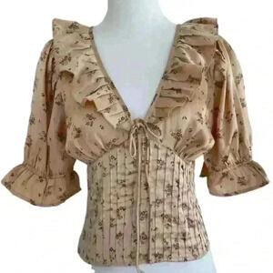 FREE PEOPLE Isabella Silky Floral Ruffle Babydoll Blouse in Copper‎ color